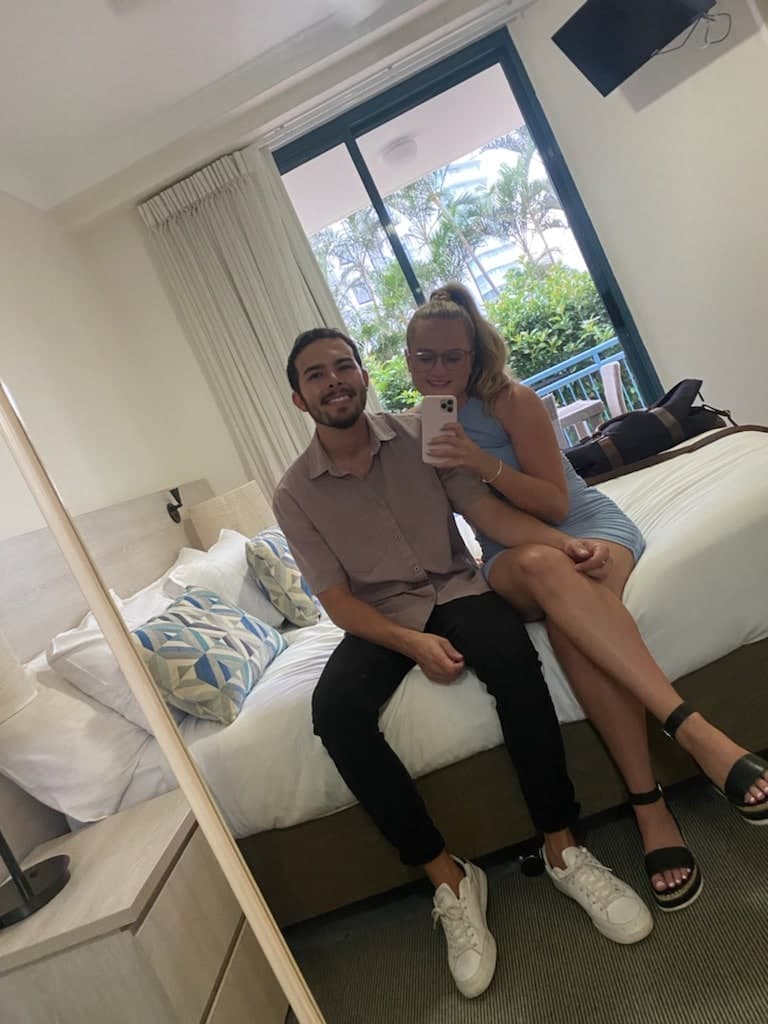Jessie and Sean taking a mirror photo on their first night away together