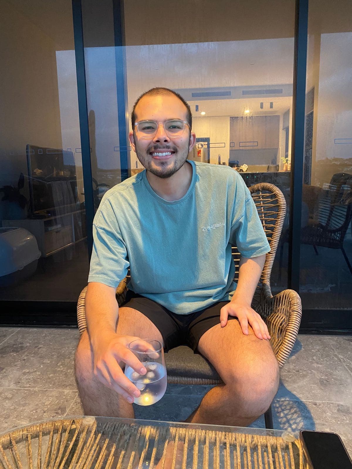 Sean smiling with a drink after moving in with Jessie